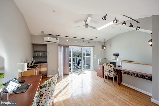 2331 Cambridge Walk, Baltimore, MD 21224 - home office with vaulted ceiling, a wall mounted air conditioner, wood finished floors, ceiling fan, and rail lighting