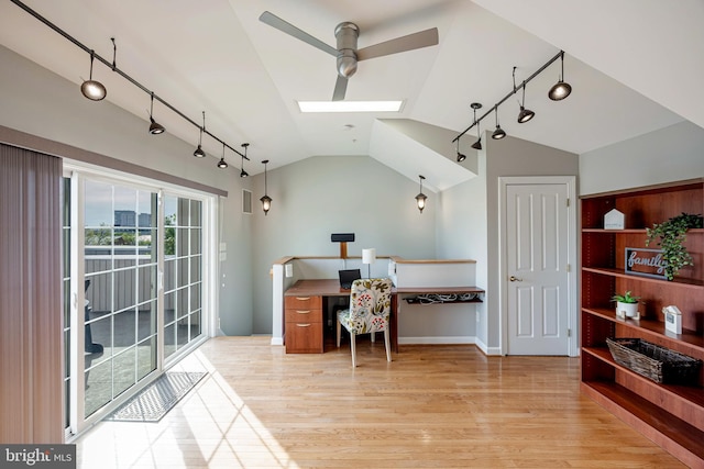 2331 Cambridge Walk, Baltimore, MD 21224 - home office featuring lofted ceiling with skylight, rail lighting, a ceiling fan, and light wood-type flooring