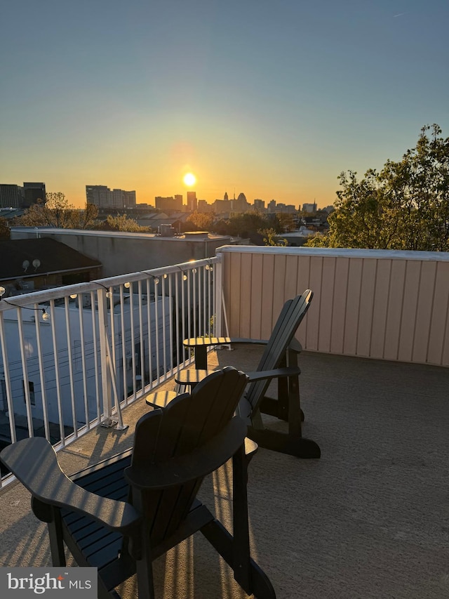 2331 Cambridge Walk, Baltimore, MD 21224 - view of patio featuring a view of city and a balcony