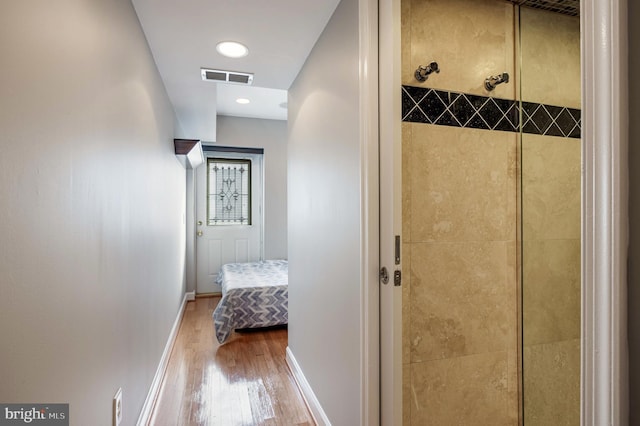 2331 Cambridge Walk, Baltimore, MD 21224 - bathroom featuring ensuite bathroom, baseboards, visible vents, wood finished floors, and a shower stall