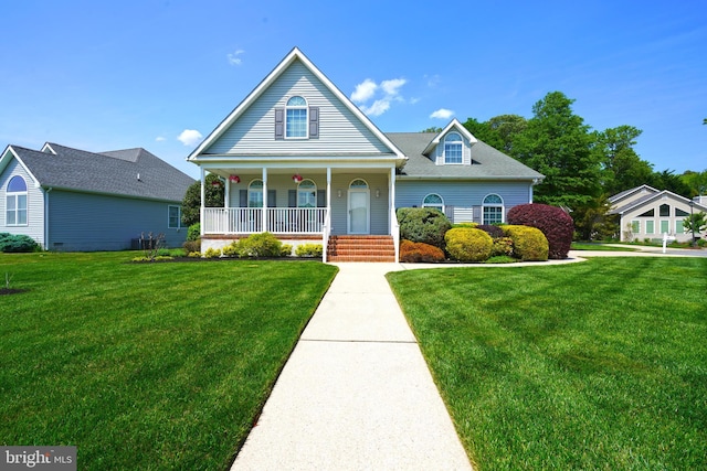 view of front of property featuring covered porch, a front yard, and central air condition unit