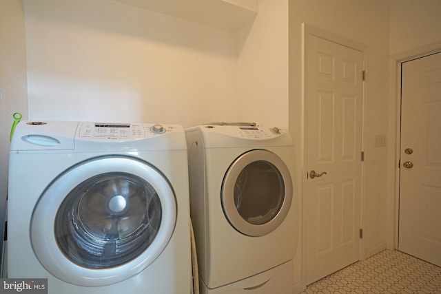 washroom with washer and clothes dryer
