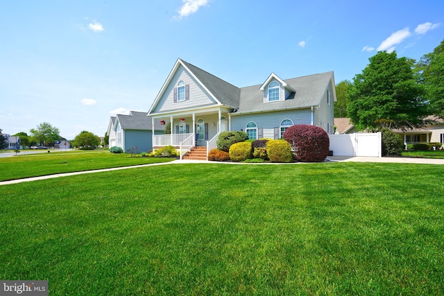view of front of house with a porch and concrete driveway
