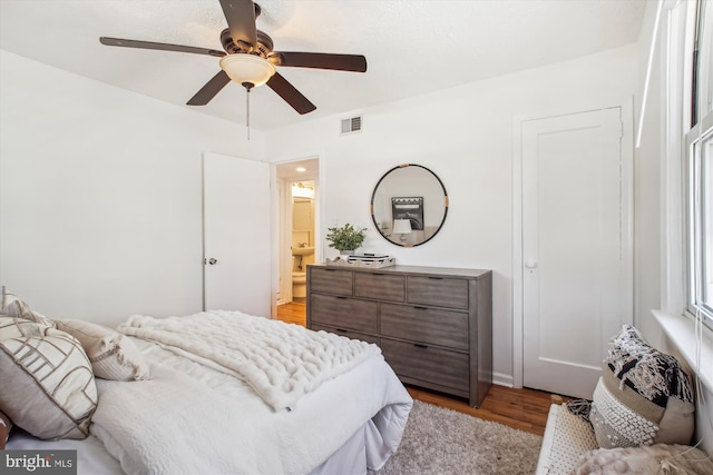 6813 Chestnut Ave, Falls Church, VA 22042 - bedroom with light wood finished floors, a ceiling fan, and visible vents