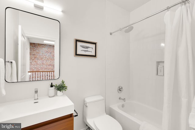 full bathroom with shower / tub combo, vanity, and toilet