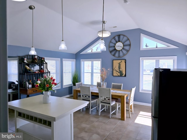 2508 Old House Point Rd, Fishing Creek, MD 21634 - kitchen with light countertops, freestanding refrigerator, baseboards, vaulted ceiling, and pendant lighting