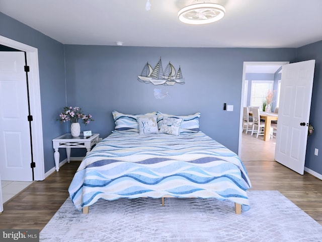 2508 Old House Point Rd, Fishing Creek, MD 21634 - bedroom with baseboards and wood finished floors