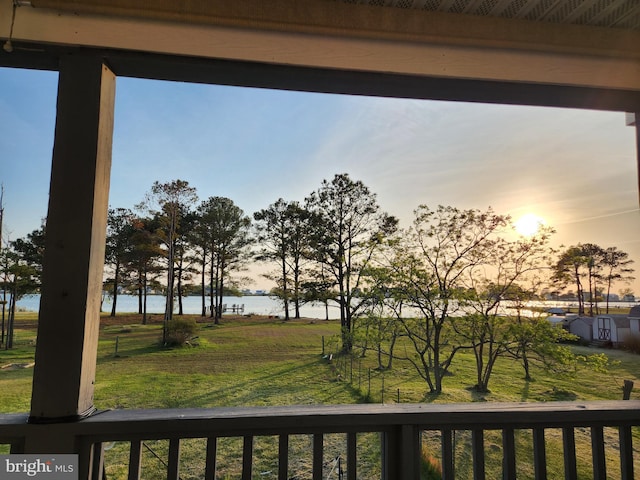 2508 Old House Point Rd, Fishing Creek, MD 21634 - balcony at dusk featuring a water view
