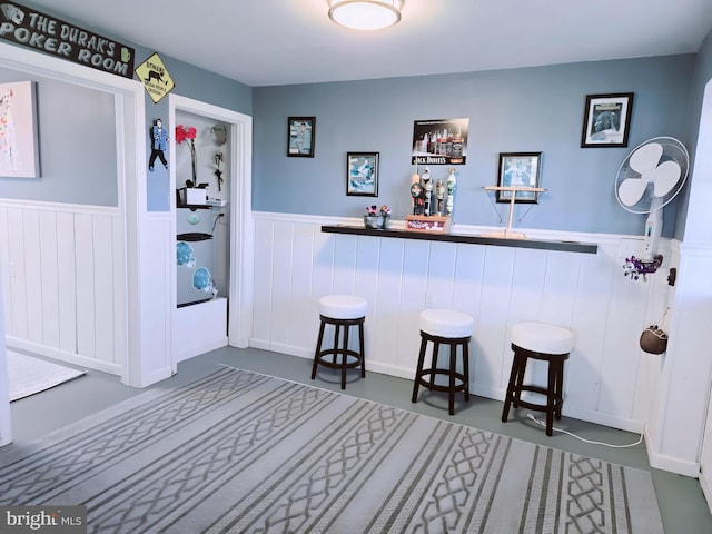 2508 Old House Point Rd, Fishing Creek, MD 21634 - bar with a decorative wall, a dry bar, and a wainscoted wall
