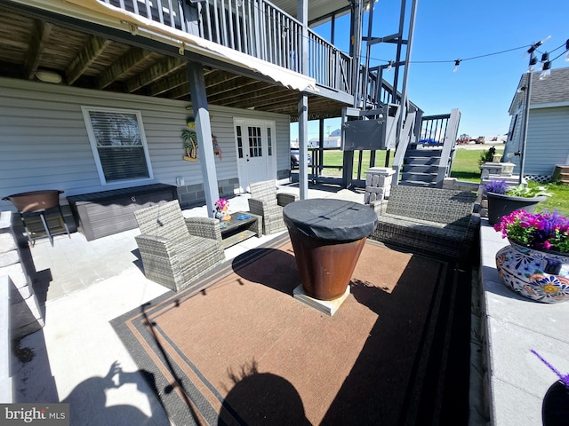 2508 Old House Point Rd, Fishing Creek, MD 21634 - view of patio / terrace featuring stairs, outdoor lounge area, and a wooden deck