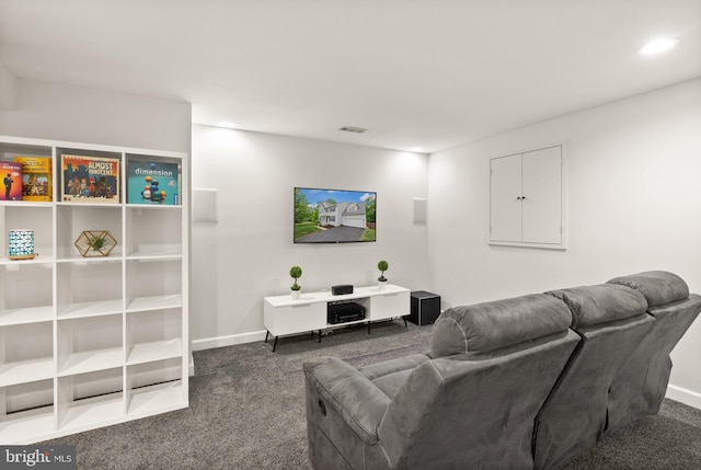 living room with carpet floors, baseboards, and visible vents