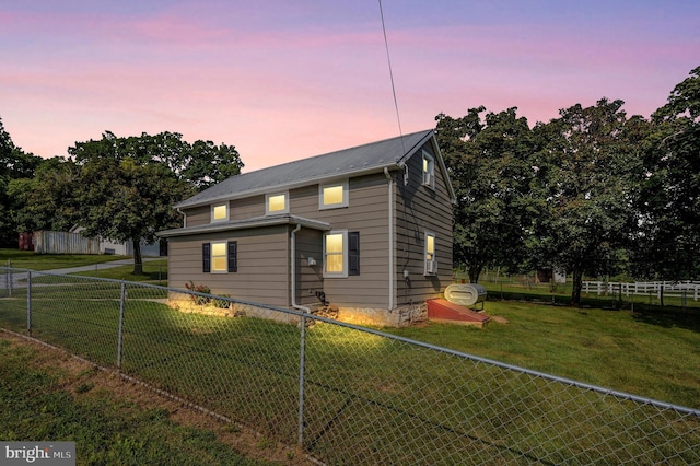 12836 Hessong Bridge Rd, Thurmont, MD 21788 - view of front of property with a lawn, a fenced backyard, and metal roof