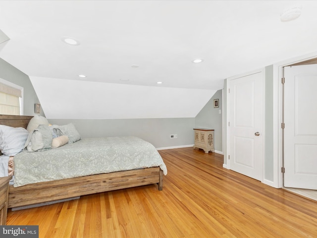 507 Kerwin Ct, Silver Spring, MD 20901 - bedroom featuring light wood-style flooring, lofted ceiling, baseboards, and recessed lighting