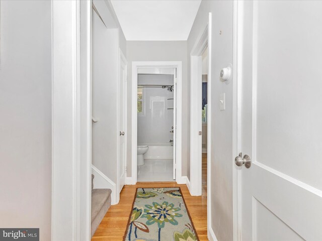 507 Kerwin Ct, Silver Spring, MD 20901 - corridor with light wood-style floors, baseboards, and stairway