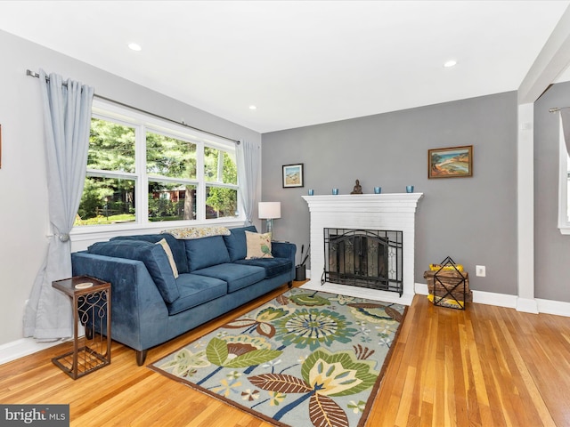 507 Kerwin Ct, Silver Spring, MD 20901 - living room featuring wood finished floors, a fireplace, baseboards, and recessed lighting