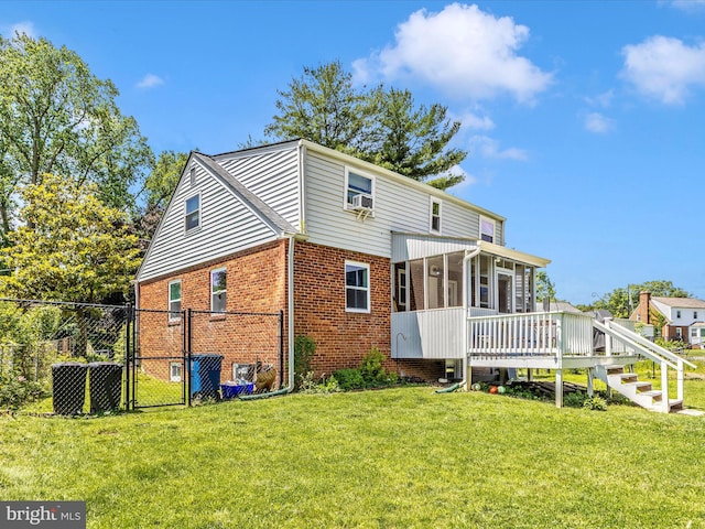 507 Kerwin Ct, Silver Spring, MD 20901 - rear view of house with a gate, a sunroom, brick siding, a deck, and cooling unit