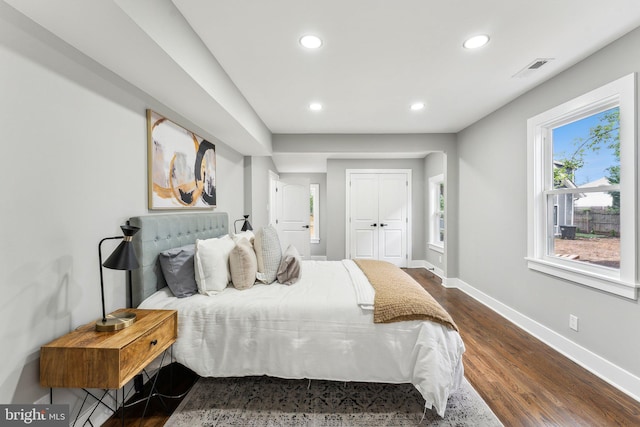 3104 Douglas St NE, Washington, DC 20018 - bedroom with baseboards, recessed lighting, dark wood-style floors, and a closet