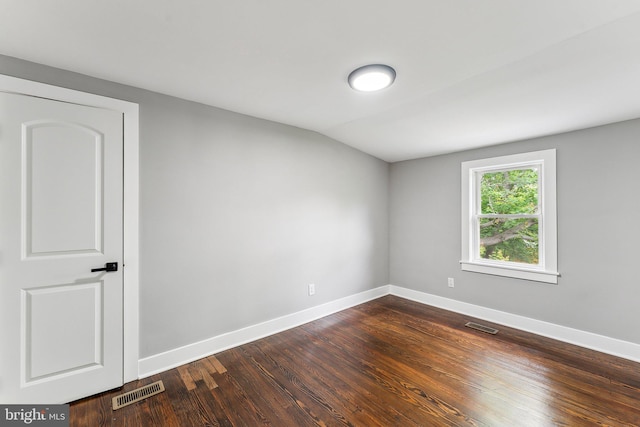 3104 Douglas St NE, Washington, DC 20018 - unfurnished room featuring baseboards and dark wood-style floors