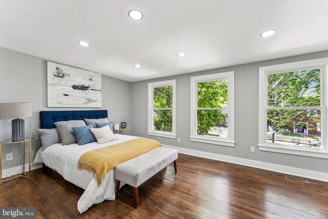 3104 Douglas St NE, Washington, DC 20018 - bedroom featuring multiple windows, recessed lighting, baseboards, and wood finished floors