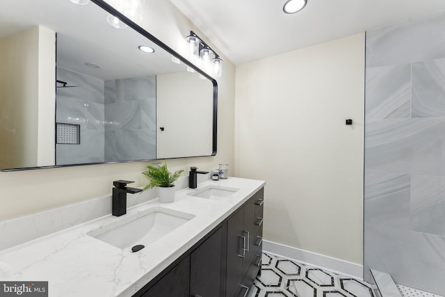 3104 Douglas St NE, Washington, DC 20018 - full bath featuring double vanity, a walk in shower, recessed lighting, and baseboards