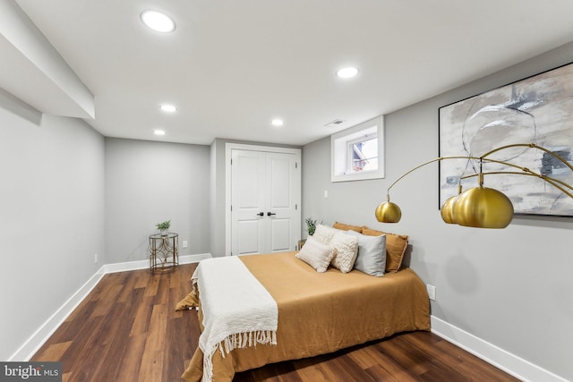 3104 Douglas St NE, Washington, DC 20018 - bedroom featuring wood finished floors, recessed lighting, baseboards, and a closet