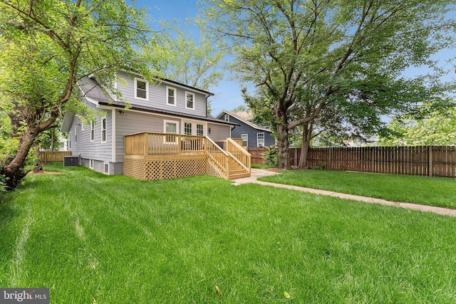 3104 Douglas St NE, Washington, DC 20018 - rear view of house with a wooden deck