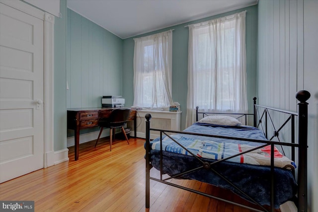 bedroom featuring wood-type flooring