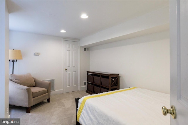carpeted bedroom with recessed lighting, baseboards, and visible vents