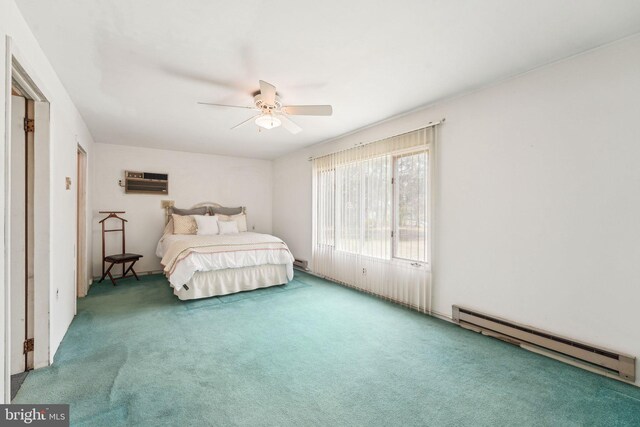 carpeted bedroom with ceiling fan, a wall mounted AC, and baseboard heating