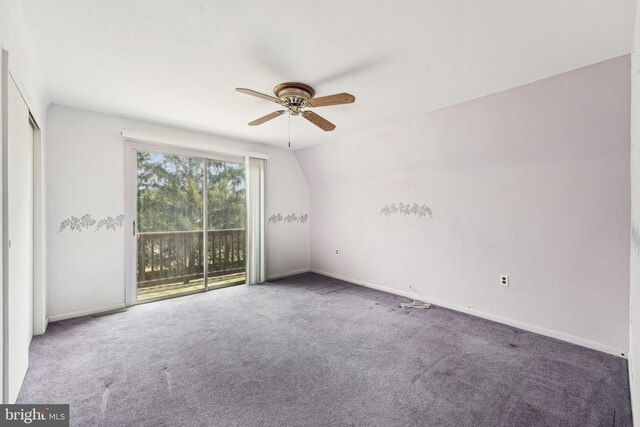 spare room with baseboards, carpet, and ceiling fan