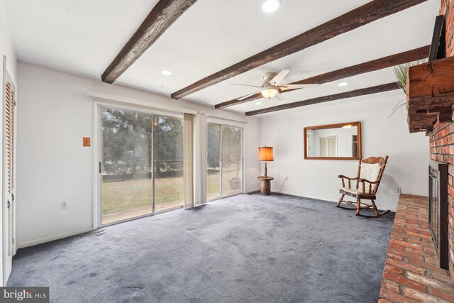 unfurnished room featuring a fireplace, carpet flooring, recessed lighting, and beam ceiling