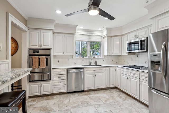 40 Treaty Elm Ln, Haddonfield, NJ 08033 - kitchen featuring a sink, stainless steel appliances, tasteful backsplash, a warming drawer, and a ceiling fan