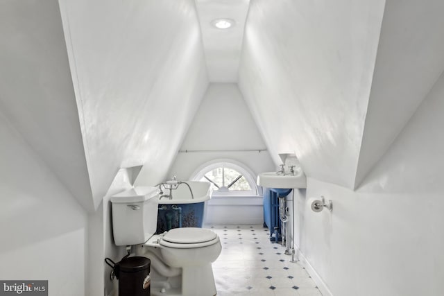 40 Treaty Elm Ln, Haddonfield, NJ 08033 - bathroom featuring toilet, a sink, vaulted ceiling, and baseboards