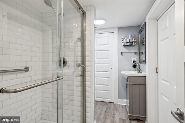 40 Treaty Elm Ln, Haddonfield, NJ 08033 - full bath with wood finished floors, a shower stall, and vanity