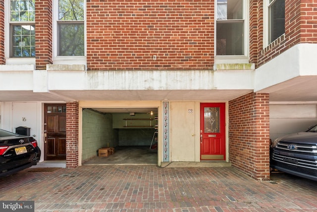 18 University Mews, Philadelphia, PA 19104 - doorway to property with a garage and brick siding
