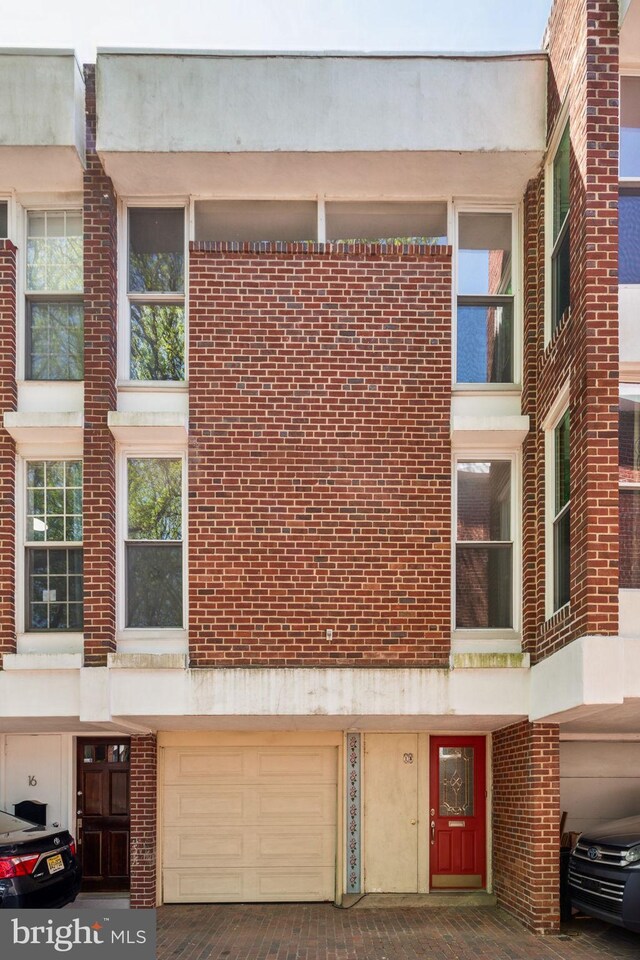 18 University Mews, Philadelphia, PA 19104 - view of property with a garage and driveway