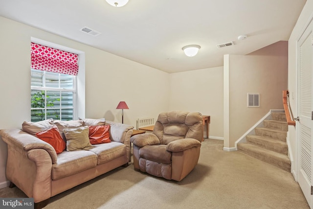7601 Willow Bottom Rd, Sykesville, MD 21784 - living room featuring stairway, visible vents, and light colored carpet