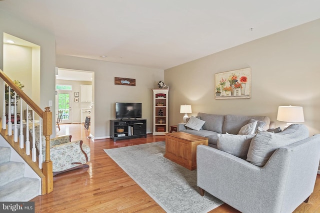 7601 Willow Bottom Rd, Sykesville, MD 21784 - living room featuring light wood finished floors and stairway