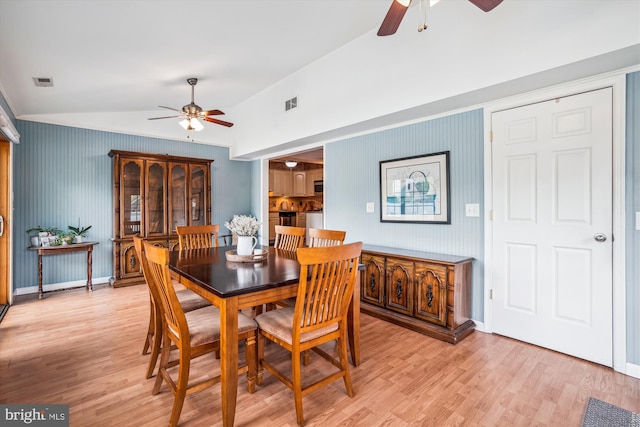 107 Bonnie View Rd, Glen Burnie, MD 21060 - dining room with ceiling fan, light wood-style flooring, vaulted ceiling, and baseboards