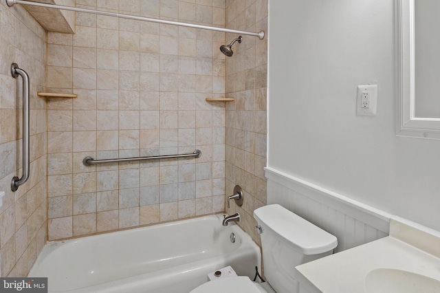 full bathroom featuring washtub / shower combination, toilet, and vanity