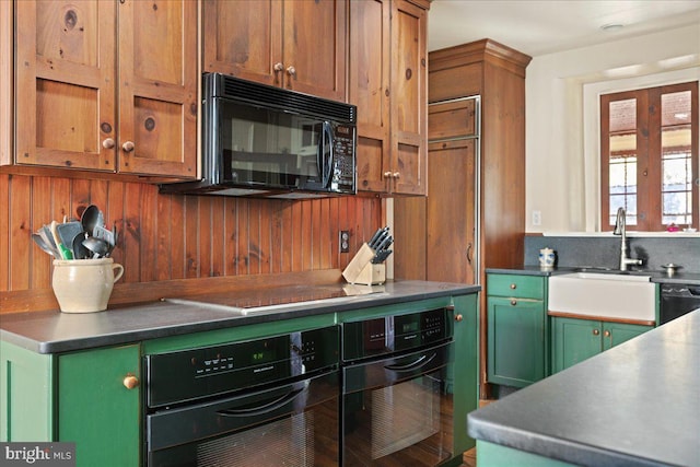 51 Cowpath Rd, Souderton, PA 18964 - kitchen with wood walls, black appliances, a sink, and brown cabinets