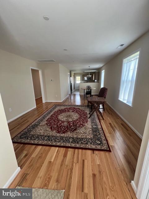 2287 Waterview Dr, Nanticoke, MD 21840 - living room with wood finished floors, visible vents, and baseboards