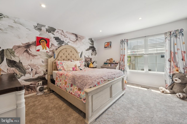 bedroom with light carpet and recessed lighting