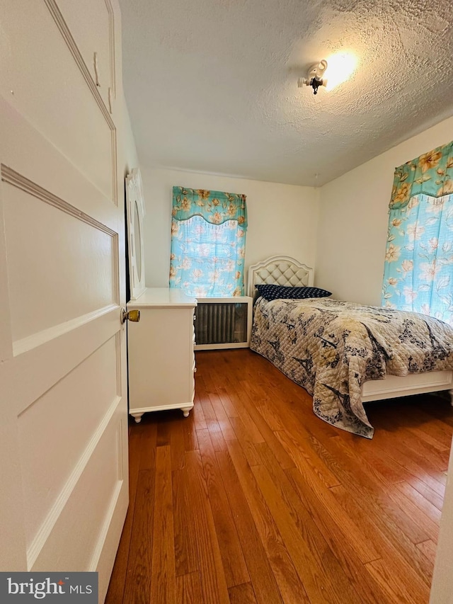 241 Ardmore Ave, Upper Darby, PA 19082 - bedroom with hardwood / wood-style flooring and a textured ceiling