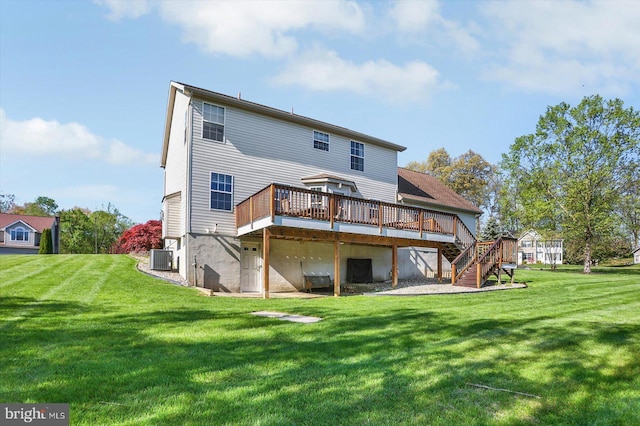 back of house featuring stairs, a lawn, central air condition unit, and a deck