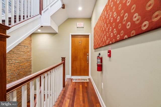 1519 Pine St Unit 7, Philadelphia, PA 19102 - hallway featuring recessed lighting, wood-type flooring, lofted ceiling, and baseboards