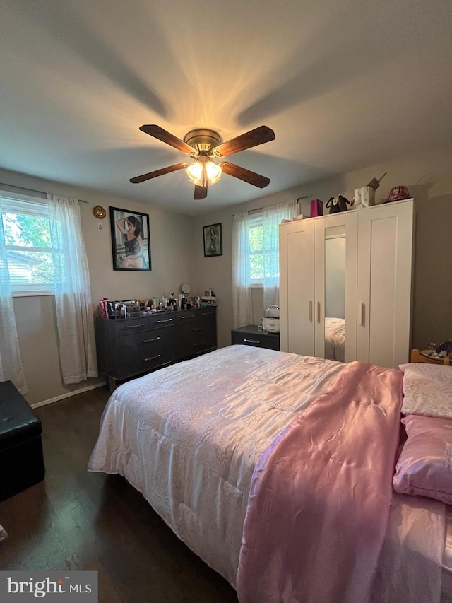 229 Old Line Ave, Laurel, MD 20724 - bedroom with multiple windows, dark wood finished floors, and ceiling fan
