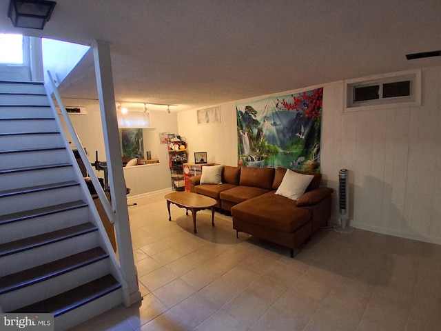 229 Old Line Ave, Laurel, MD 20724 - living area featuring stairs, tile patterned flooring, and baseboards