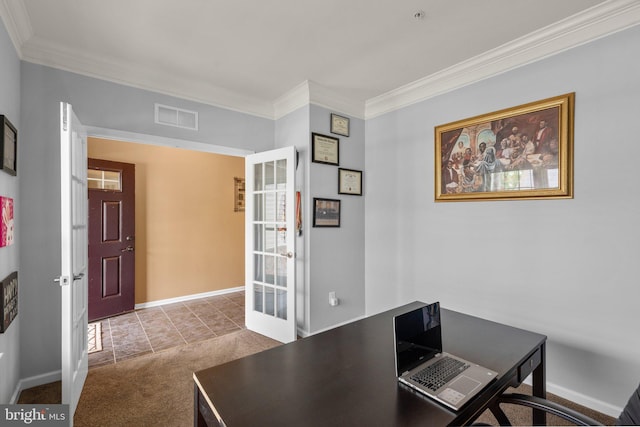 unfurnished office with carpet, visible vents, baseboards, and ornamental molding