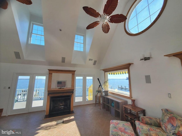 16254 Neabsco Beach Way, Woodbridge, VA 22191 - living area featuring a ceiling fan, a high ceiling, and a healthy amount of sunlight